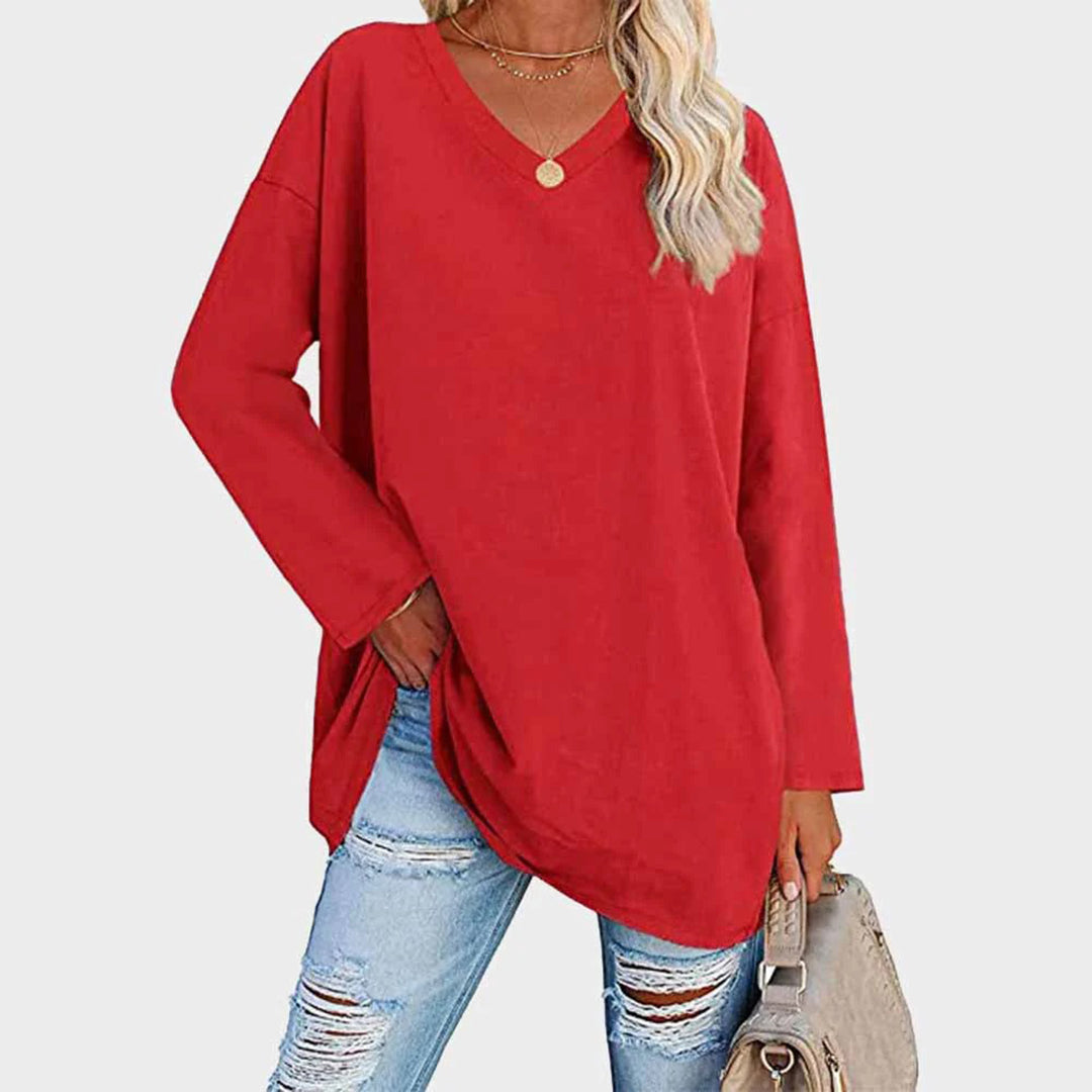 Amelia - Suéter oversize fucsia con cuello en V mujer