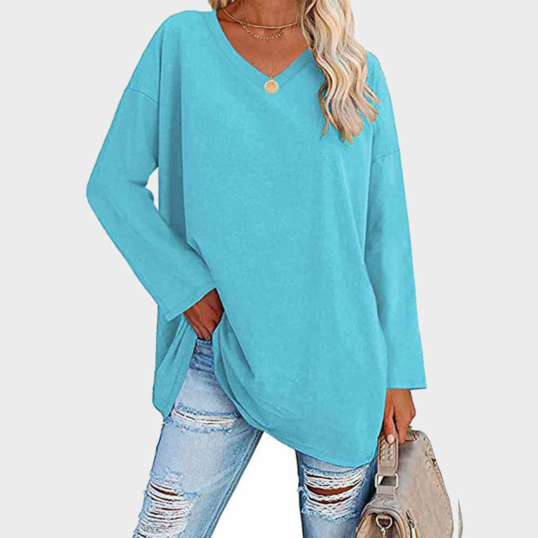 Amelia - Suéter oversize fucsia con cuello en V mujer