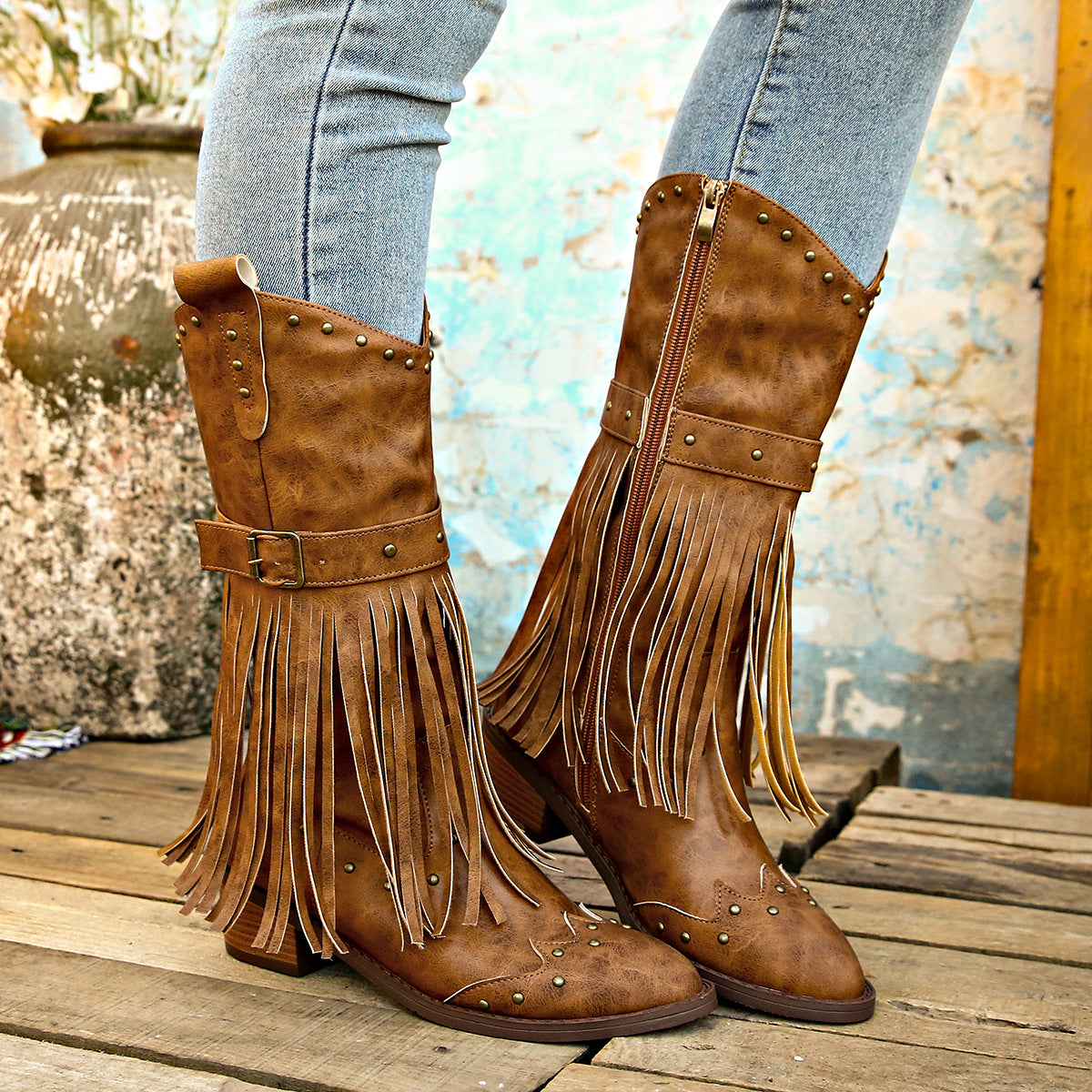 Solara – Botas cowboy con flecos y tachuelas