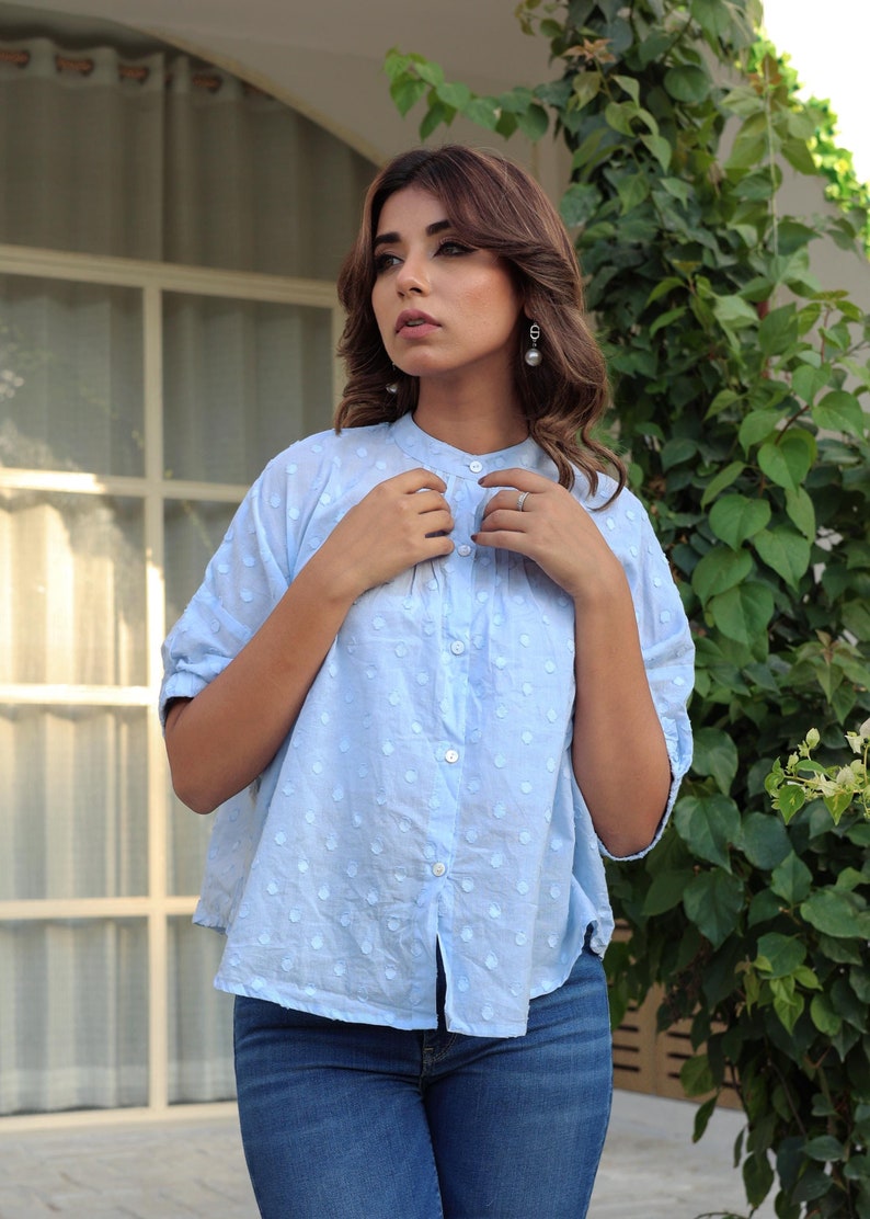 Blusa abotonada con textura